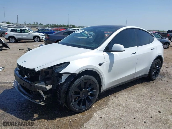 2021 Tesla Model Y Long Range with VIN 5YJYGAEE8MF187987, listed as a IAAI auction lot 41795626 with 56,007 mi miles. Bid and sale history available at carsss.com. Image 2.