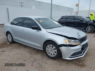 2015 Volkswagen Jetta S z VIN 3VW2K7AJ2FM312911, wystawiony jako IAAI lot #42570728 z przebiegiem 94 385 mil mil oraz . Historia ofert i sprzedaży dostępna na DreamBid. Obrazek 1.