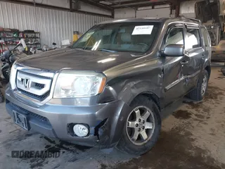 2010 Honda Pilot Touring with VIN 5FNYF4H89AB026005, listed as a IAAI auction lot 42118607 with 182,689 mi miles. Bid and sale history available at carsss.com. Image 17.
