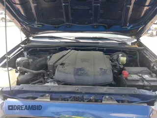 2015 Toyota Tacoma with VIN 3TMLU4EN1FM187705, listed as a IAAI auction lot 42119222 with 115,471 mi miles and . Bid and sale history available at DreamBid. Image 10.