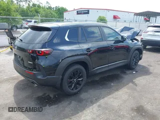 2025 Mazda CX-50 S Select with VIN 7MMVABAMXSN326118, listed as a IAAI auction lot 42136197 with 5,142 mi miles and . Bid and sale history available at DreamBid. Image 4.