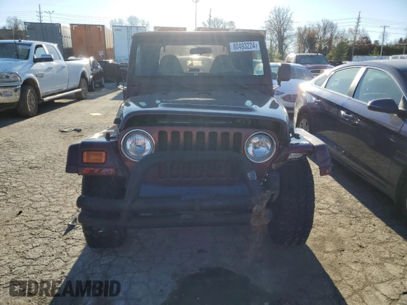 2001 Jeep Wrangler Sahara with VIN 1J4FA59S41P337699, listed as a Copart auction lot 80493224 with 143,036 mi miles and Salvage Title. Bid and sale history available at carsss.com. Image 5.