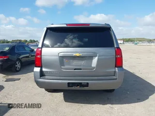 2020 Chevrolet Suburban LT z VIN 1GNSCHKC8LR157188, wystawiony jako IAAI lot #41578614 z przebiegiem 82 566 mil mil oraz . Historia ofert i sprzedaży dostępna na DreamBid. Obrazek 16.