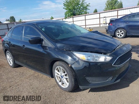 2018 Ford Focus SE z VIN 1FADP3F20JL288437, wystawiony jako IAAI lot #42278885 z przebiegiem 132 504 mil mil oraz . Historia ofert i sprzedaży dostępna na DreamBid. Obrazek 1.