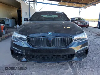 2018 BMW 5 Series 540i xDrive with VIN WBAJE7C5XJWD52054, listed as a Copart auction lot 47306535 with 49,185 mi miles and Salvage title. Bid and sale history available at DreamBid. Image 5.