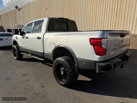 2016 Nissan Titan XD PRO-4X with VIN 1N6BA1F46GN507954, listed as a Copart auction lot 77952834 with 140571 miles and Clean Title. Bid and sale history available at carsss.com. Image 3.