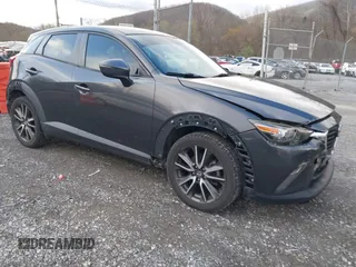 2017 Mazda CX-3 Touring with VIN JM1DKFC76H0175520, listed as a IAAI auction lot 41919185 with 105,346 mi miles and . Bid and sale history available at DreamBid. Image 1.