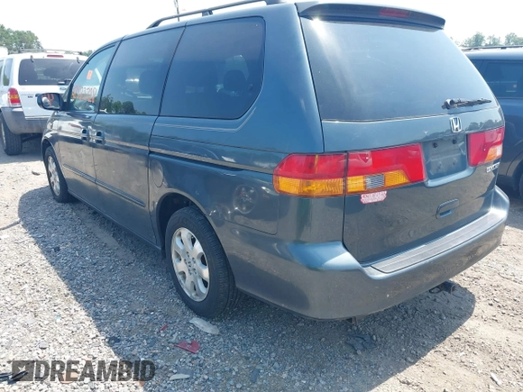 2004 Honda Odyssey EX-L with VIN 5FNRL18964B069905, listed as a IAAI auction lot 42583728 with 217,237 mi miles and . Bid and sale history available at DreamBid. Image 3.