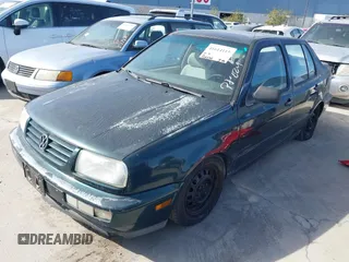 1998 Volkswagen Jetta z VIN 3VWRF61H5WM228558, wystawiony jako IAAI lot #41614111 z przebiegiem 198 205 mil mil oraz . Historia ofert i sprzedaży dostępna na DreamBid. Obrazek 2.