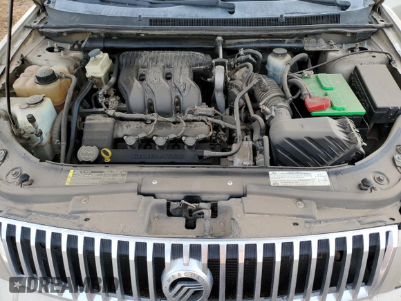 2007 Mercury Montego Premier z VIN 1MEHM42157G608181, wystawiony jako Copart lot #44276675 z przebiegiem 186 917 mil mil oraz Tytuł czysty. Historia ofert i sprzedaży dostępna na DreamBid. Obrazek 11.