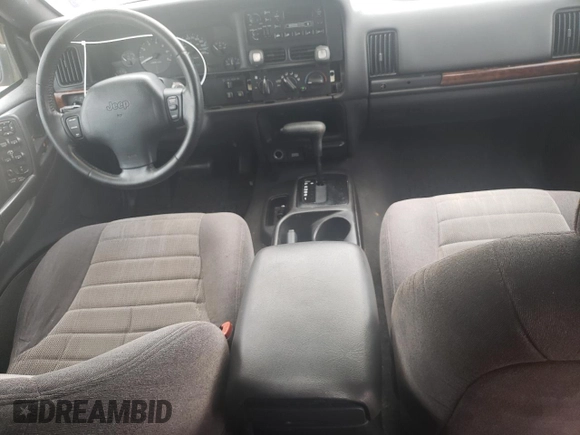 1998 Jeep Grand Cherokee Laredo with VIN 1J4FX58S3WC144684, listed as a Copart auction lot 67226694 with 106,602 mi miles and Clean Title. Bid and sale history available at carsss.com. Image 8.