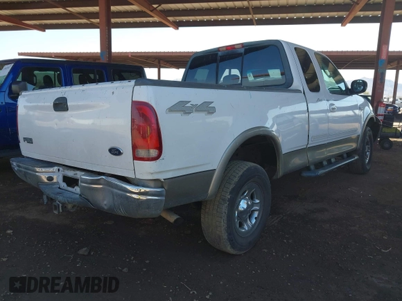 2003 Ford F-150 XL with VIN 1FTRX18L03NA45728, listed as a IAAI auction lot 41860421 with 179,596 mi miles. Bid and sale history available at carsss.com. Image 4.