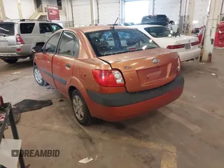 2009 Kia Rio LX with VIN KNADE223796547229, listed as a IAAI auction lot 41947371 with 153,061 mi miles and . Bid and sale history available at DreamBid. Image 3.
