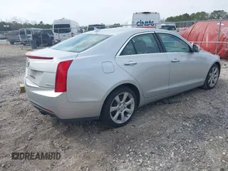 2014 Cadillac ATS Luxury RWD z VIN 1G6AB5RX4E0113469, wystawiony jako IAAI lot #41673813 z przebiegiem 102 537 mil mil oraz . Historia ofert i sprzedaży dostępna na DreamBid. Obrazek 4.