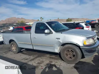 1997 Ford F-150 with VIN 1FTEF17W3VLA19510, listed as a IAAI auction lot 41711010 with 214,984 mi miles and . Bid and sale history available at DreamBid. Image 13.