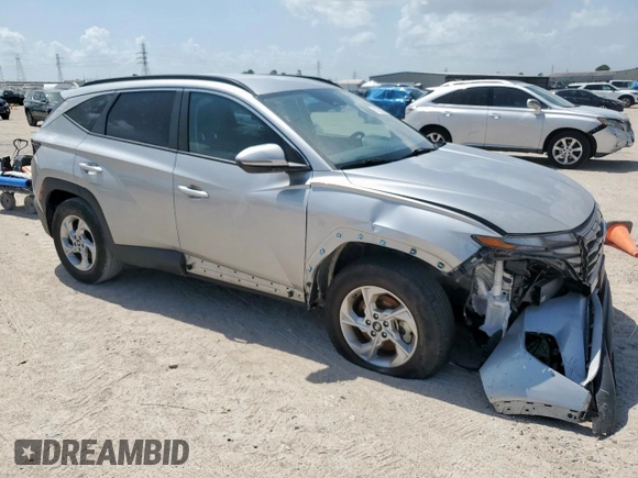 2023 Hyundai Tucson SEL with VIN 5NMJBCAE7PH220482, listed as a Copart auction lot 61783325 with 35,764 mi miles and Salvage title. Bid and sale history available at DreamBid. Image 4.
