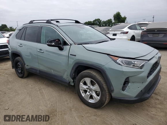 2021 Toyota RAV4 Hybrid XLE with VIN 2T3RWRFV8MW116853, listed as a Copart auction lot 65974935 with 89,319 mi miles and Salvage title. Bid and sale history available at DreamBid. Image 4.