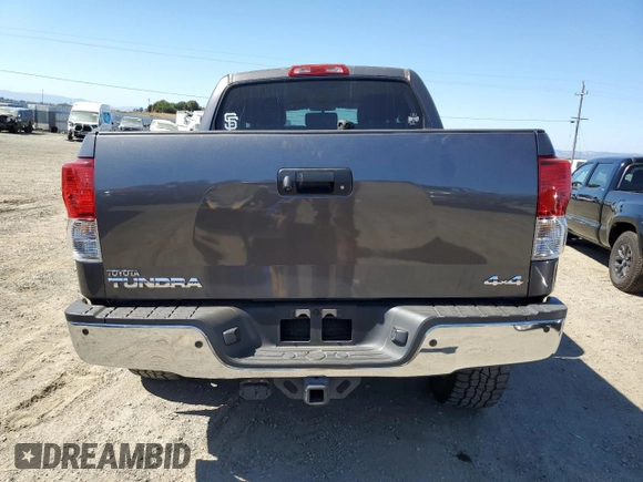 2012 Toyota Tundra 4WD Truck LTD with VIN 5TFHY5F13CX220317, listed as a Copart auction lot 73597184 with 127,307 mi miles and Salvage Title. Bid and sale history available at carsss.com. Image 6.