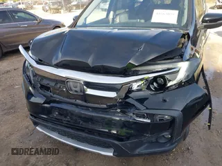 2020 Honda Pilot EX-L with VIN 5FNYF5H52LB003289, listed as a IAAI auction lot 41563075 with 151,682 mi miles. Bid and sale history available at carsss.com. Image 6.
