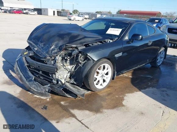 2007 Hyundai Tiburon GT with VIN KMHHN66F87U259322, listed as a IAAI auction lot 41204907 with 79,379 mi miles. Bid and sale history available at carsss.com. Image 2.