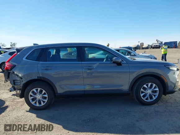 2024 Honda CR-V LX with VIN 2HKRS4H22RH427131, listed as a IAAI auction lot 41365338 with 16,280 mi miles and . Bid and sale history available at DreamBid. Image 14.