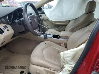 2012 Cadillac CTS with VIN 1G6DM5E3XC0145916, listed as a Copart auction lot 47287295 with 146,221 mi miles and Salvage Title. Bid and sale history available at DreamBid. Image 7.