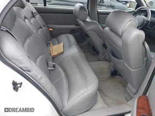 1999 Buick Park Avenue Ultra with VIN 1G4CU5217X4658627, listed as a IAAI auction lot 42013174 with 148,856 mi miles. Bid and sale history available at carsss.com. Image 8.