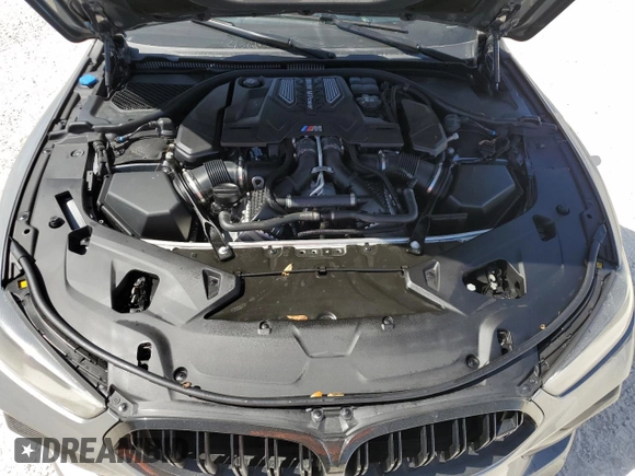 2024 BMW M8 Competition z VIN WBSGV0C02RCN81436, wystawiony jako Copart lot #76872664 z przebiegiem Nie podano mil oraz Nie do naprawy • Non repairable. Historia ofert i sprzedaży dostępna na DreamBid. Obrazek 11.