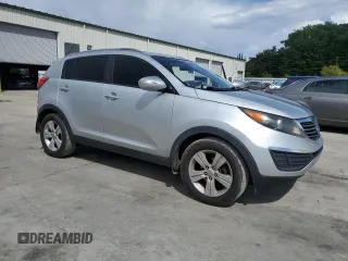 2011 Kia Sportage LX z VIN KNDPB3A20B7062731, wystawiony jako Copart lot #52949695 z przebiegiem 242 639 mil mil oraz Szkoda całkowita • Salvage title. Historia ofert i sprzedaży dostępna na DreamBid. Obrazek 4.