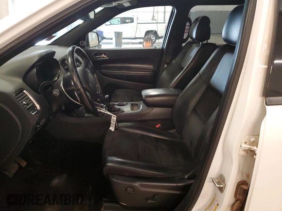 2019 Dodge Durango GT Plus with VIN 1C4RDJDG7KC634237, listed as a Copart auction lot 59366285 with 139,056 mi miles and Salvage title. Bid and sale history available at DreamBid. Image 7.