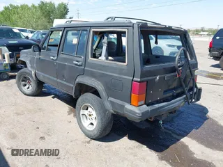1995 Jeep Cherokee Sport with VIN 1J4FJ68S5SL541413, listed as a IAAI auction lot 42722408 with 335,432 mi miles and . Bid and sale history available at DreamBid. Image 3.