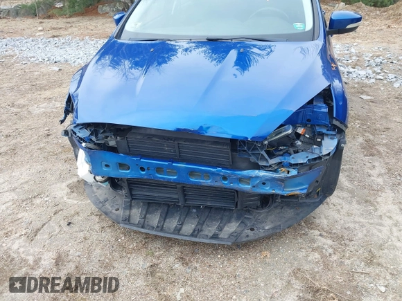 2018 Ford Focus SE z VIN 1FADP3F25JL255840, wystawiony jako IAAI lot #41852913 z przebiegiem 64 010 mil mil oraz . Historia ofert i sprzedaży dostępna na DreamBid. Obrazek 6.