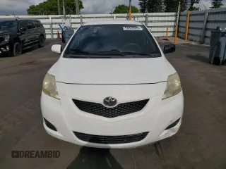 2012 Toyota Yaris z VIN JTDBT4K35CL017457, wystawiony jako Copart lot #58820985 z przebiegiem 120 901 mil mil oraz Szkoda całkowita • Salvage title. Historia ofert i sprzedaży dostępna na DreamBid. Obrazek 5.