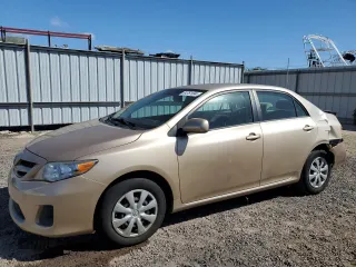 2011 Toyota Corolla L with VIN 2T1BU4EEXBC662749, listed as a Copart auction lot 84761994 with 66,697 mi miles and Salvage Title. Bid and sale history available at carsss.com. Image 1.