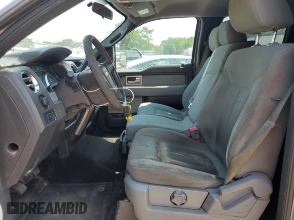2011 Ford F-150 XL with VIN 1FTFW1EF2BFB58531, listed as a Copart auction lot 63631885 with 283,137 mi miles and Salvage title. Bid and sale history available at DreamBid. Image 7.