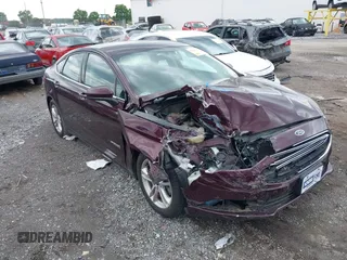 2018 Ford Fusion SE z VIN 3FA6P0LU9JR153083, wystawiony jako IAAI lot #42380417 z przebiegiem 150 638 mil mil oraz . Historia ofert i sprzedaży dostępna na DreamBid. Obrazek 1.