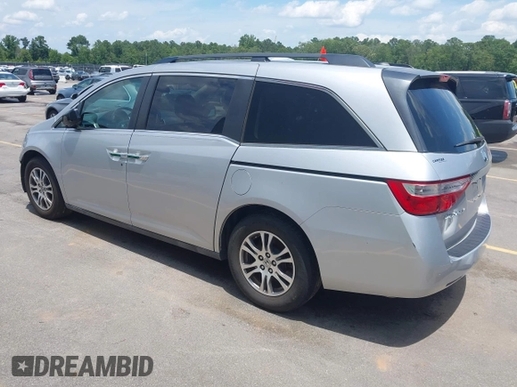2012 Honda Odyssey EX-L with VIN 5FNRL5H65CB076534, listed as a IAAI auction lot 42440258 with 150,866 mi miles and . Bid and sale history available at DreamBid. Image 3.