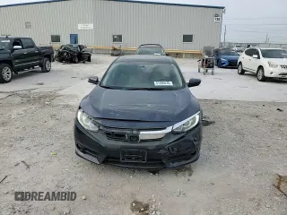 2016 Honda Civic EX-T z VIN 19XFC1F37GE012186, wystawiony jako Copart lot #51590575 z przebiegiem 121 041 mil mil oraz Szkoda całkowita • Salvage title. Historia ofert i sprzedaży dostępna na DreamBid. Obrazek 11.