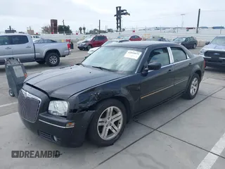 2006 Chrysler 300 Touring with VIN 2C3KA53G76H200278, listed as a IAAI auction lot 42044879 with 122,601 mi miles and . Bid and sale history available at DreamBid. Image 2.