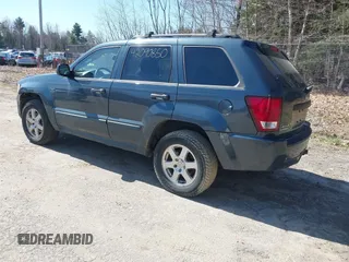 2008 Jeep Grand Cherokee Laredo with VIN 1J8GR48K98C161239, listed as a IAAI auction lot 42090850 with 218,063 mi miles. Bid and sale history available at carsss.com. Image 3.