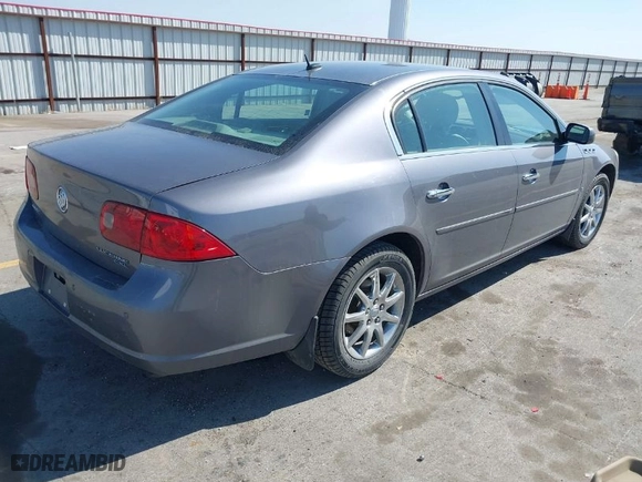 2007 Buick Lucerne V6 CXL with VIN 1G4HD57217U227515, listed as a IAAI auction lot 41800602 with 74,065 mi miles. Bid and sale history available at carsss.com. Image 4.