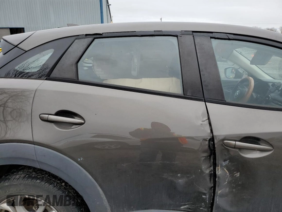 2018 Mazda CX-3 Sport z VIN JM1DKFB77J0312732, wystawiony jako Copart lot #45720065 z przebiegiem 99 866 mil mil oraz Szkoda całkowita • Salvage title. Historia ofert i sprzedaży dostępna na DreamBid. Obrazek 11.