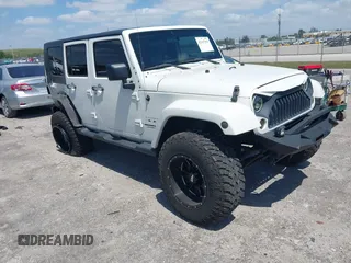2010 Jeep Wrangler with VIN 1J4HB5H16AL186600, listed as a IAAI auction lot 42147992 with 134,717 mi miles and . Bid and sale history available at DreamBid. Image 1.