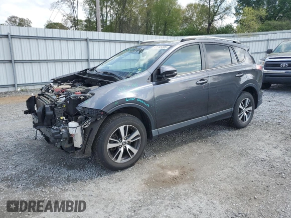2018 Toyota RAV4 XLE with VIN JTMRFREV2JJ215776, listed as a Copart auction lot 51745205 with 52,009 mi miles and Salvage Title. Bid and sale history available at DreamBid. Image 1.