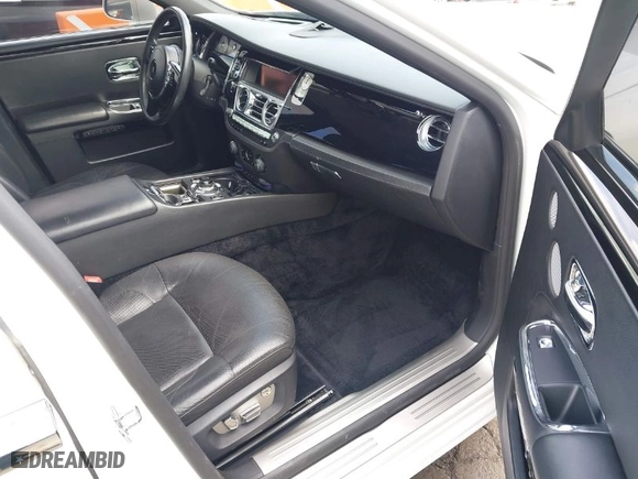 2013 Rolls-Royce Ghost with VIN SCA664S56DUX51795, listed as a IAAI auction lot 41921013 with 70,988 mi miles. Bid and sale history available at carsss.com. Image 5.