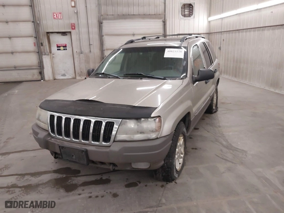 2003 Jeep Grand Cherokee Laredo with VIN 1J4GW48SX3C544237, listed as a IAAI auction lot 40823228 with 1 mi miles. Bid and sale history available at carsss.com. Image 6.