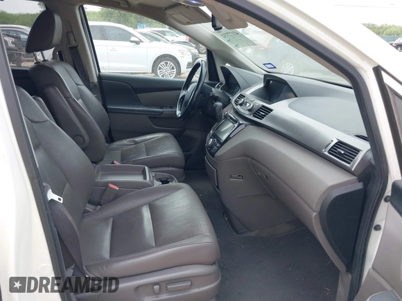 2015 Honda Odyssey EX-L with VIN 5FNRL5H68FB056282, listed as a IAAI auction lot 42177732 with 194,244 mi miles and . Bid and sale history available at DreamBid. Image 5.