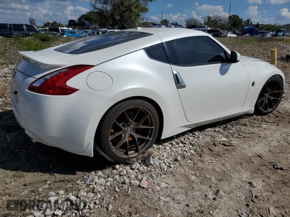 2014 Nissan 370Z Touring with VIN JN1AZ4EH0EM636520, listed as a Copart auction lot 73661434 with 0 mi miles and Salvage Title. Bid and sale history available at carsss.com. Image 3.
