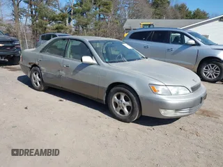 1998 Lexus ES 300 Luxury Sport Sdn with VIN JT8BF28GXW5041007, listed as a IAAI auction lot 41780343 with 239,324 mi miles. Bid and sale history available at carsss.com. Image 1.