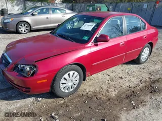 2006 Hyundai Elantra GLS with VIN KMHDN46D86U301455, listed as a IAAI auction lot 41940849 with 239,294 mi miles. Bid and sale history available at carsss.com. Image 2.